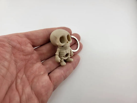 Fünf Skelett-Schlüsselanhänger in Totenkopfform aus PLA in Desert Tan – Ansicht 2