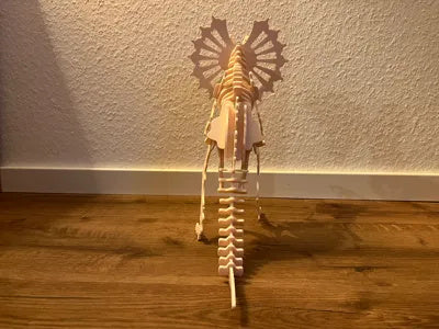 Beigefarbenes Dilophosaurus-3D-Puzzle in Dinosaurierform – Ansicht 6